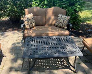 Iron Patio Set. Loveseat with Cushions and Table
