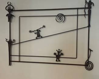 Petroglyphs: Doodle bug mat, Maze of solar spiral, rattlesnake deity, horned serpent (avanyu), moon man, warrior, iron wall sculpture