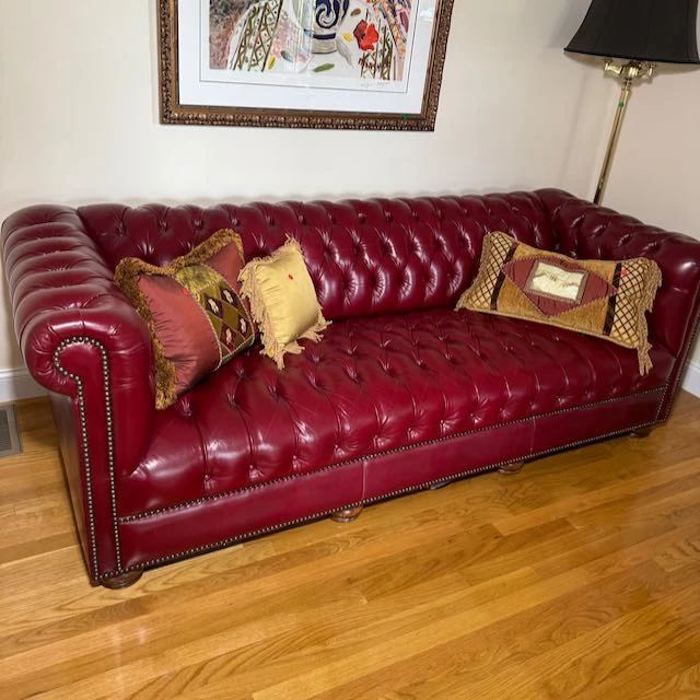 Stunning red tufted leather couch
