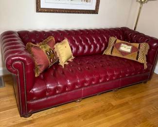 Stunning red tufted leather couch