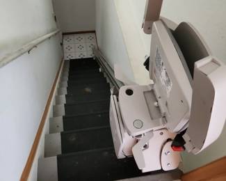 Stairlift nearly new works great has remotes