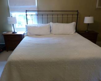 King size iron headboard with mattress & box spring, pair of night tables, lamps