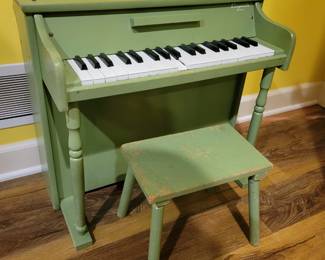Childs Piano and Bench.