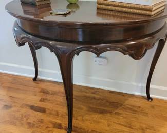 A fabulous Demi Lune Table with curved legs and apron.