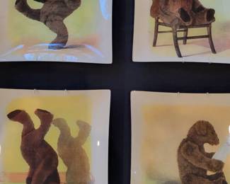 A set of 4 Signed Decoupage Plates by John Derian.