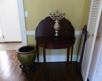 Pair of antique mahogany entrance tables and mirrors, pair of candelabras, Asian design planter