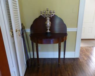 Pair of antique mahogany entrance tables and mirrors, pair of candelabras