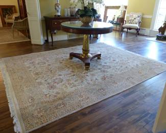 Round entrance table, area rug