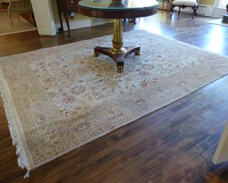 Round entrance table, area rug