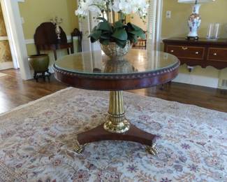 Round entrance table, area rug
