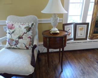 Pair of neutral accent chairs, decorative pillows, pair of petite French side tables, pair of lamps