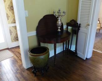 Pair of antique mahogany entrance tables and mirrors, pair of candelabras, Asian design planter