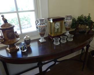 Demilune console table, assorted bric-a-brac