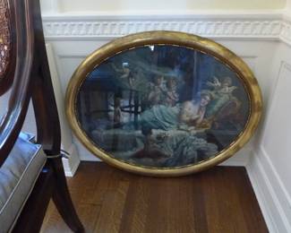 Oval brass framed art