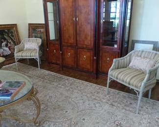 3 section display/storage/media wall unit, pair of chairs, brass coffee table, area rug