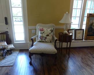 Pair of neutral accent chairs, decorative pillows, pair of petite French side tables, pair of lamps