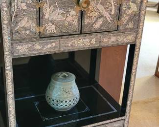A stunning Asian cabinet with inlay