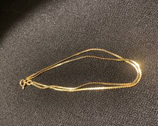 7.5” double loop gold bracelet marked 585, 2-1 grams.