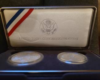 Congressional commemorative silver dollar and half dollar