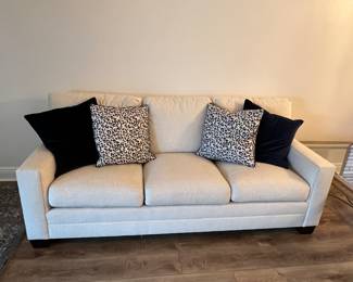 Cream colored couch in excellent condition. Available for presale.