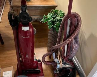 Panasonic vacuum and a Kirby vacuum
