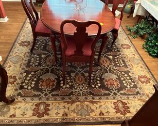 Sitting on a wonderous 8' x 10' oriental rug!