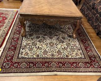 Matching coffee table on an oriental rug