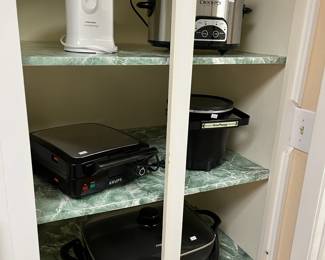 Cupboard full of fine small appliances!