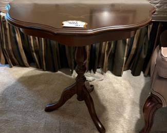 Scalloped edge table