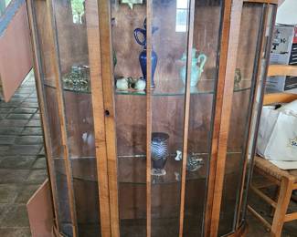 Lovely curio cabinet with glass shelves