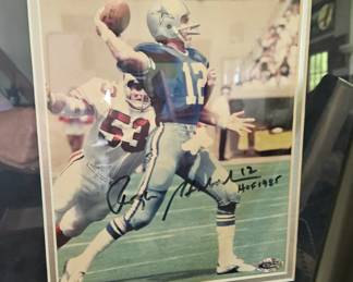Roger Staubach. Framed, signed. Certificate of authenticity attached.