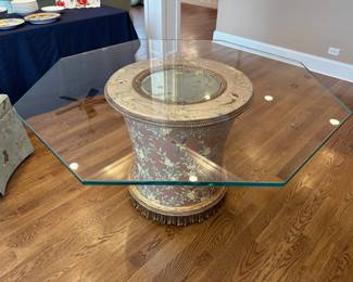 Lillian August Table adorned with flowers and birds with octagonal tempered glass top; 55.25" x 30" h