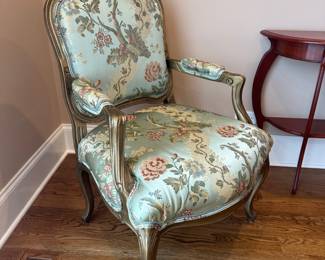 Antique Louis XVI style carved wood armchair; green silk floral upholstered