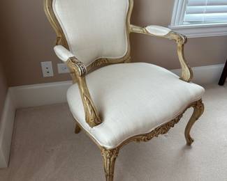 Antique carved wood Louis XVI - style armchair in cream