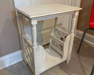 white farmhouse- style magazine rack/side table