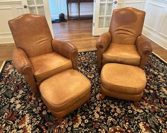 Pair of brown leather chairs with ottomans by Ethan Allen