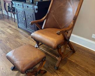 Brown Leather studded chair with ottoman, by Stickley