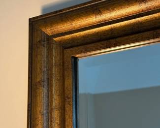 Gold framed rectangular mirror