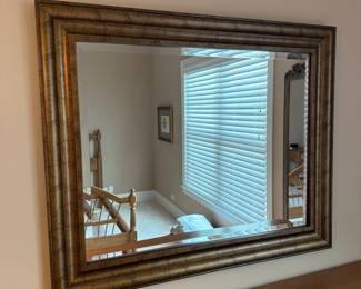 Gold framed rectangular mirror