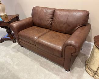 Brown leather Bennett roll arm loveseat by Ethan Allen