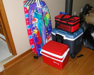 Boogie boards, beach umbrella, and a nice assortment of coolers