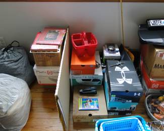 The collection of office supplies.  If you can read the boxes, it will tell you what is inside