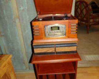 Really Nice Stereo/Radio system that  does Everything on a Hard Wood Record Stand