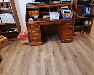 Hand Crafted Dutch Winners Only Oak Roll Top Desk; Assorted Office Supplies; Wood and faux wood bookshelves; Digital TV and so much more!!