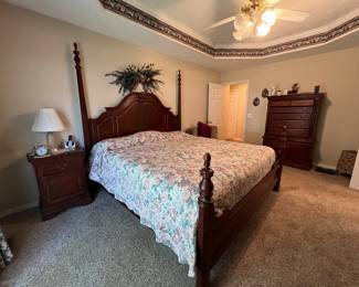 King size four poster bed with "like new" mattress set*bed, nightstand, dresser and chest of drawers all match but are sold separately