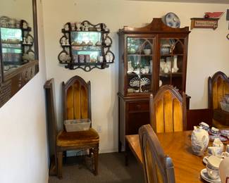Spanish Baroque style dinning table with 6 chairs and extra table leaf. 