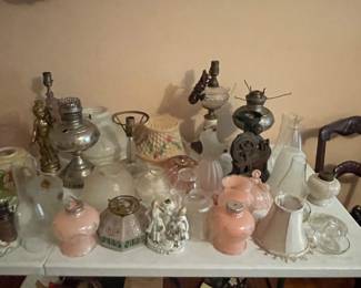 Large selection of antique light fixtures, globes, lamps, lamp parts