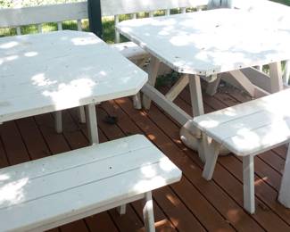 Two beautiful picnic tables w/ benches.