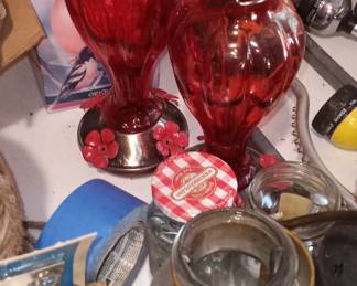 Glass hummingbird feeders.
