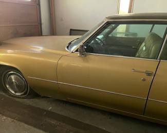 Gold 1970 Cadillac De Ville 
